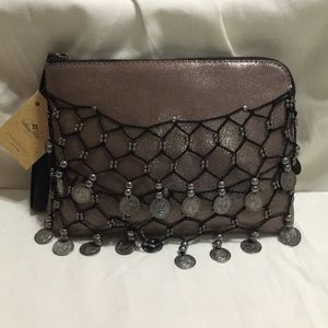 Metallic dark tan wristlet purse.